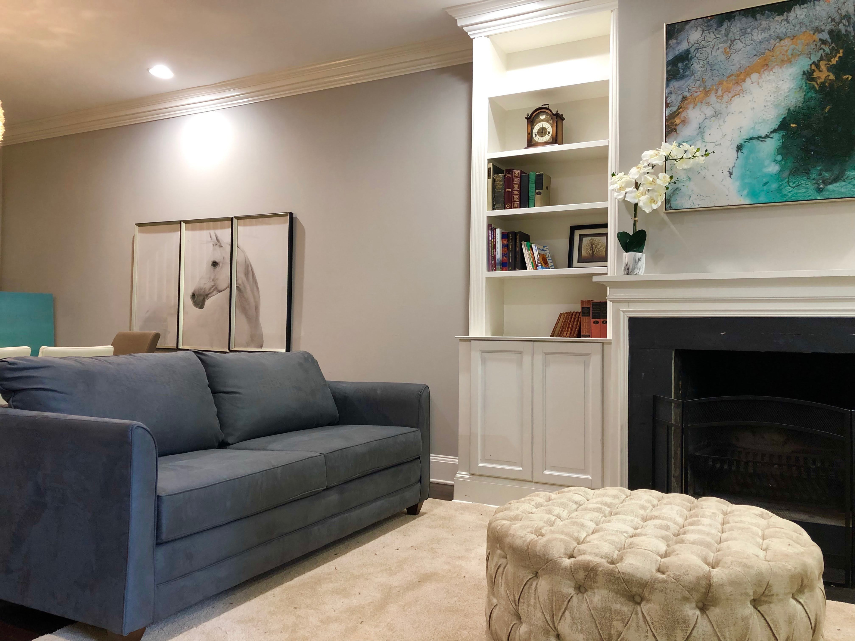The queen sofa bed offers stylish versatility—relax during the day, unwind into comfort at night, all anchored by a tufted ottoman and elegant décor.