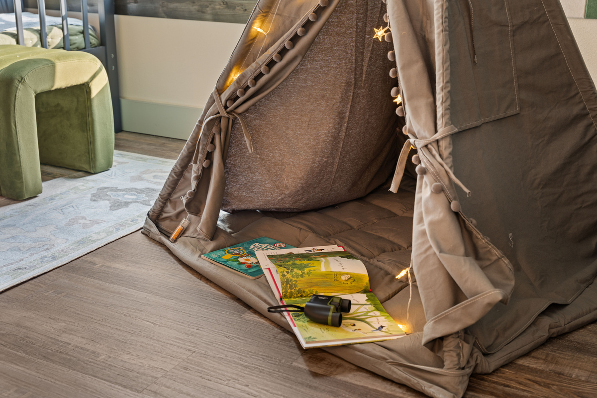 Grab a book and a flashlight and disappear into the bunk-room teepee for the night.