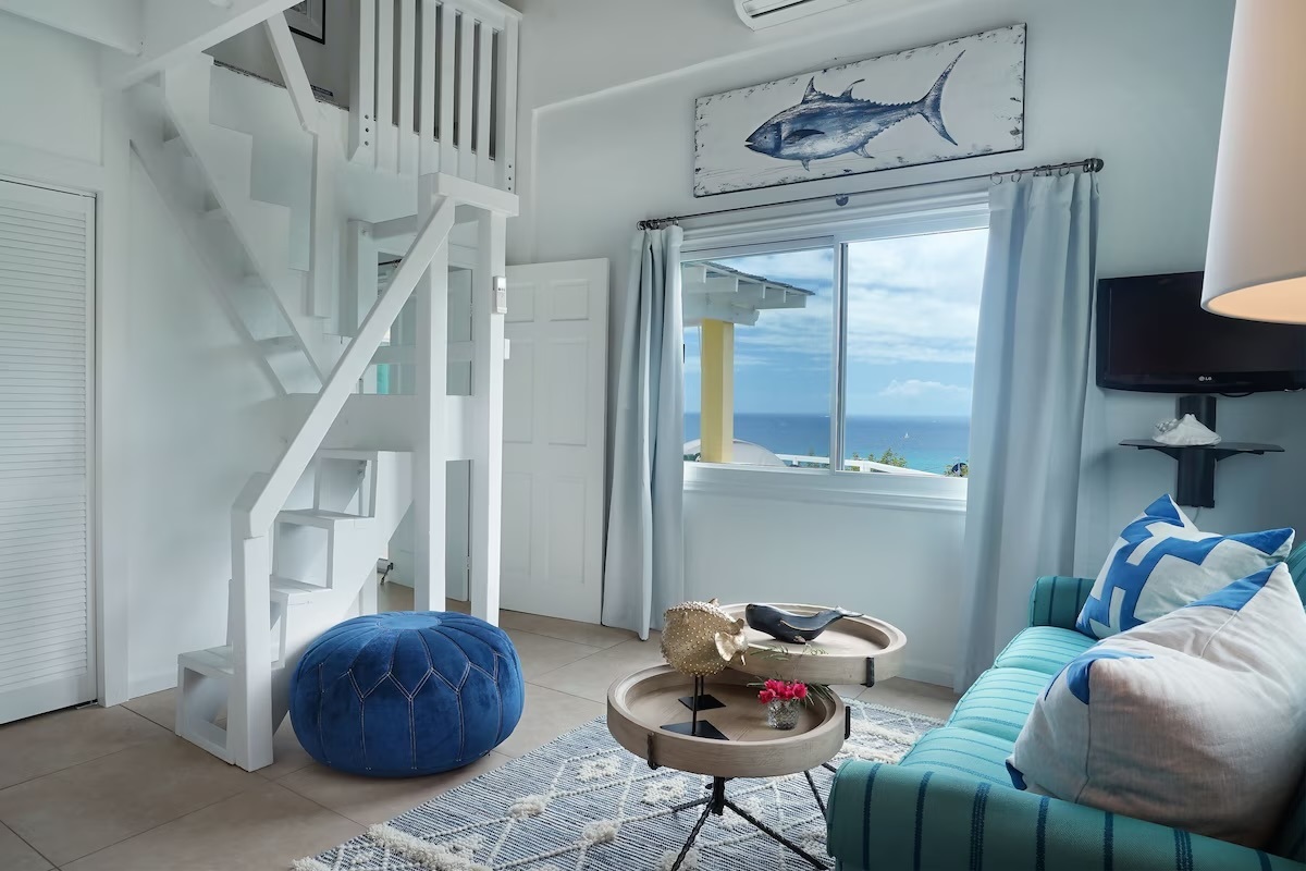 With a comfortable seating room, you'll have space to enjoy before heading upstairs to the loft with two queen beds.