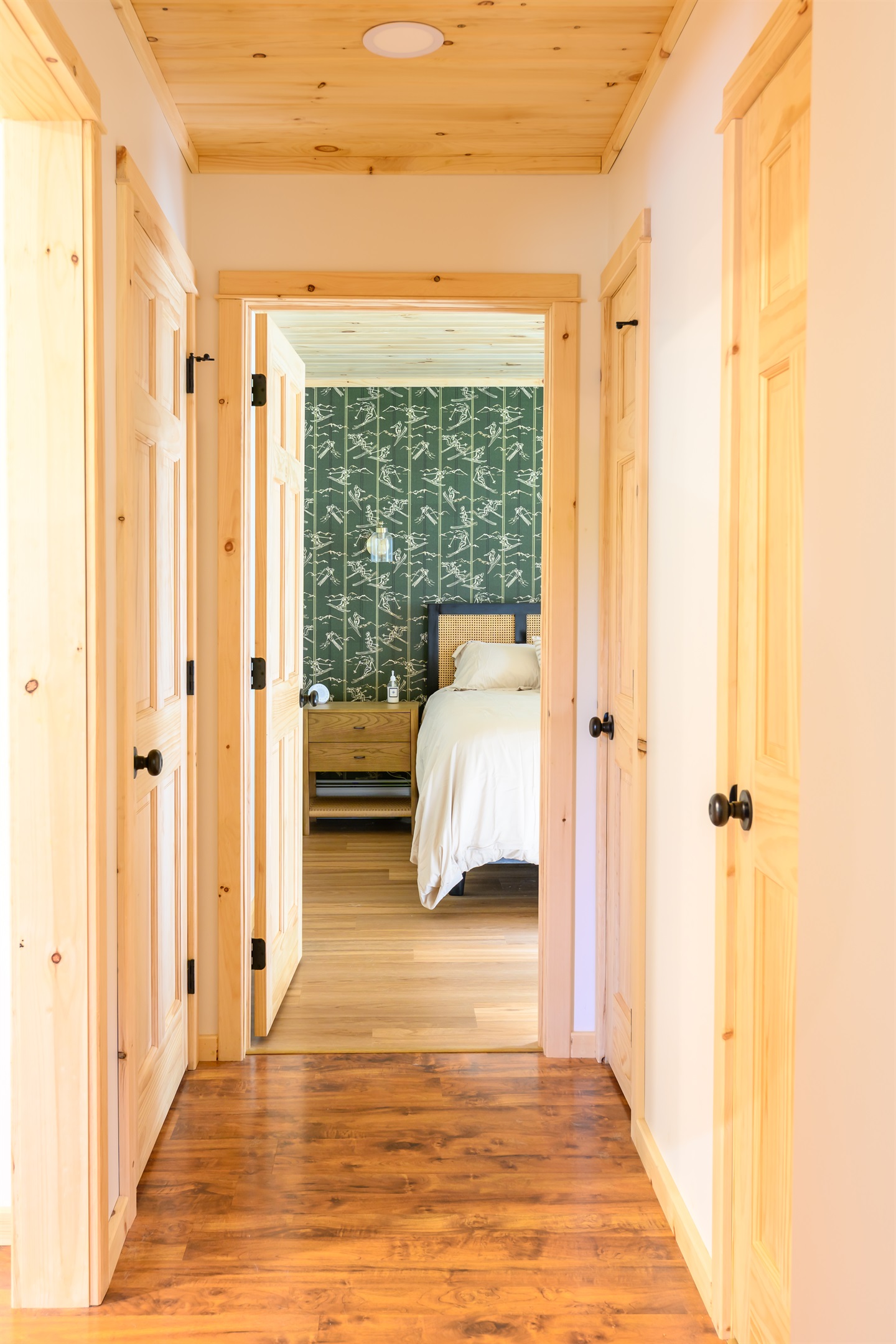 Entering the king bedroom with a premium helix midnight luxe mattress and 500tc cotton sheets