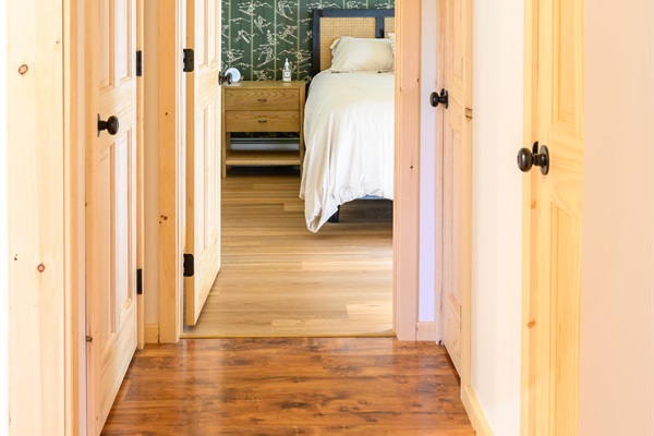 Entering the king bedroom with a premium helix midnight luxe mattress and 500tc cotton sheets