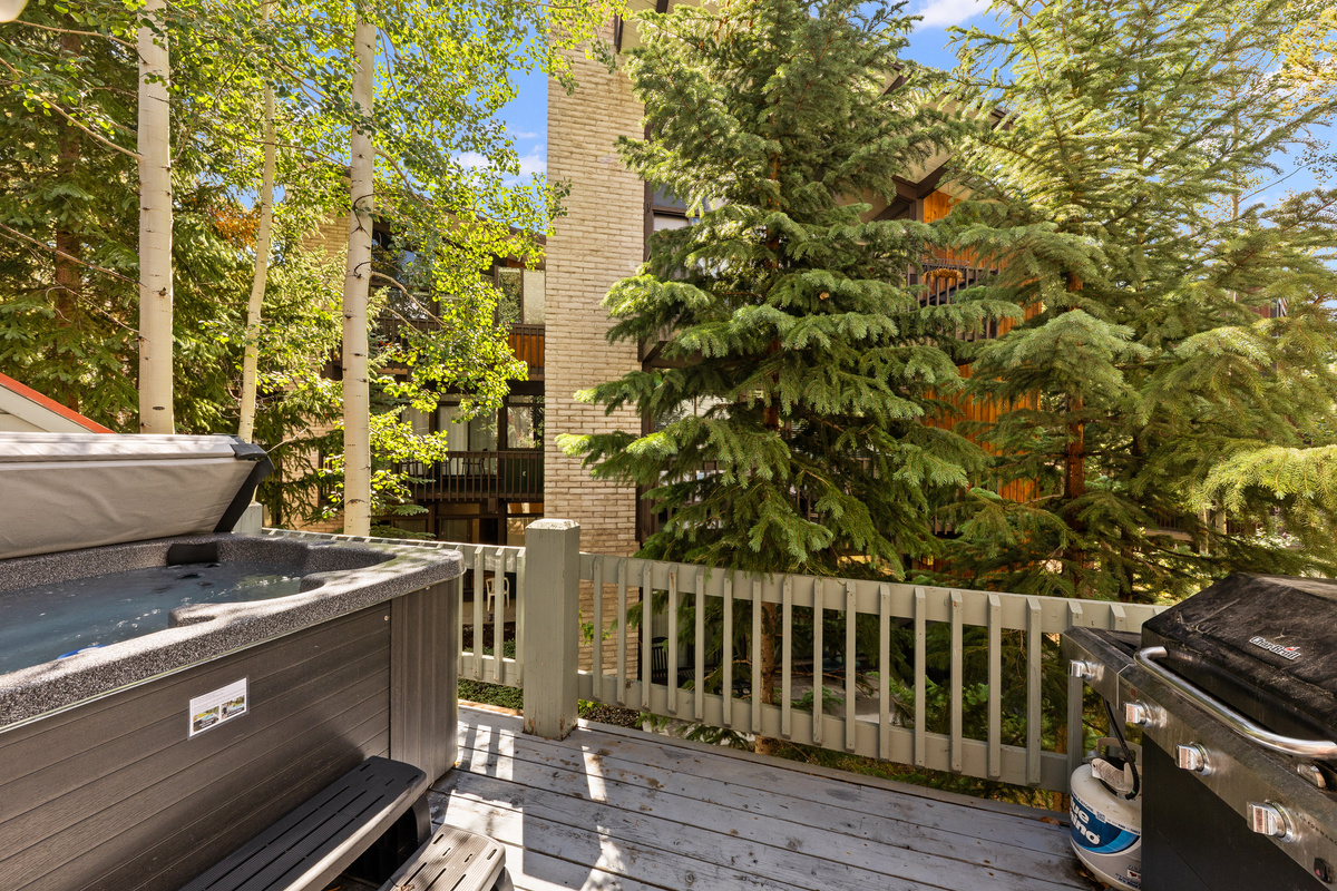 Private balcony and gas grill on second level off kitchen
