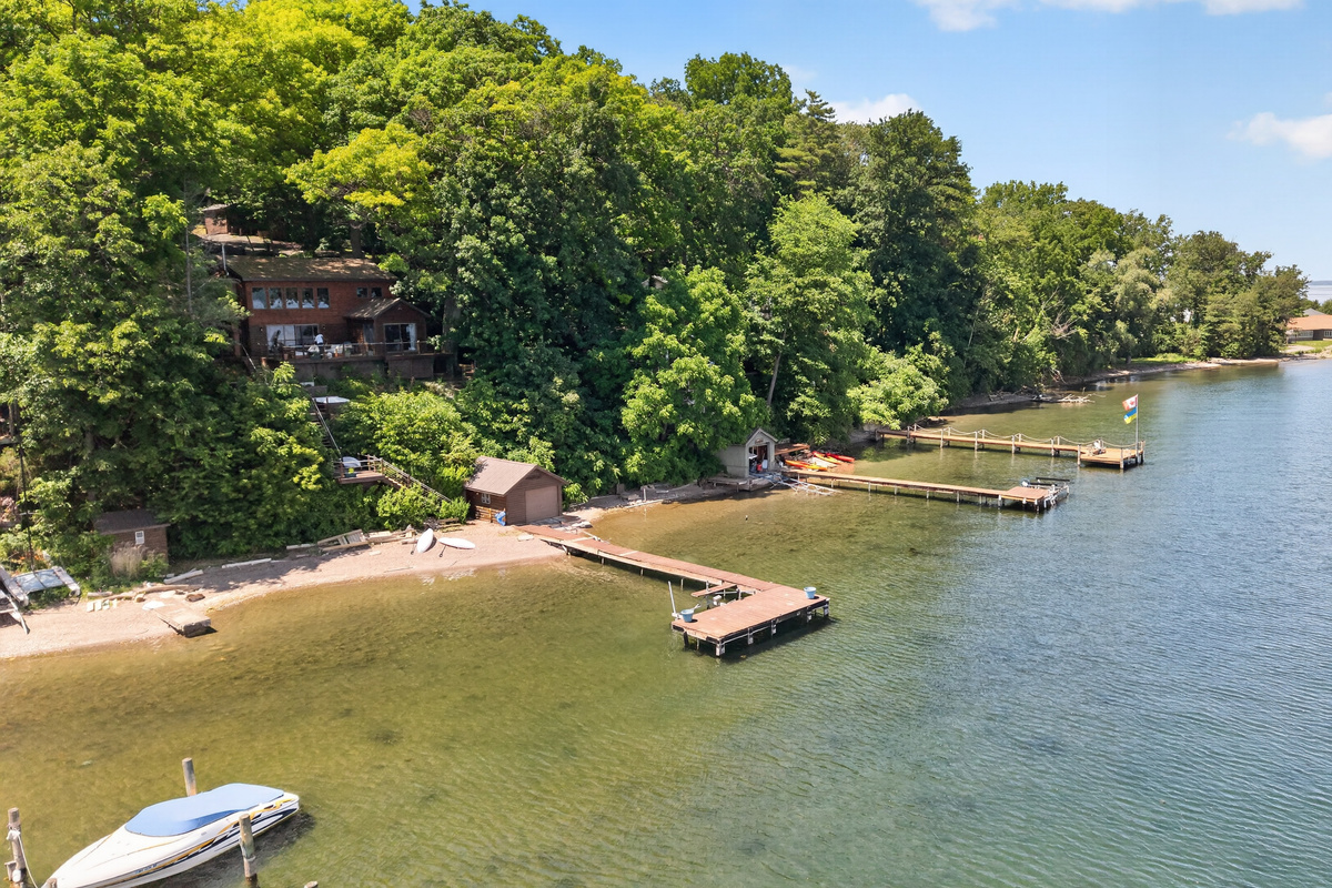 Shoreline with docks extending into the lake