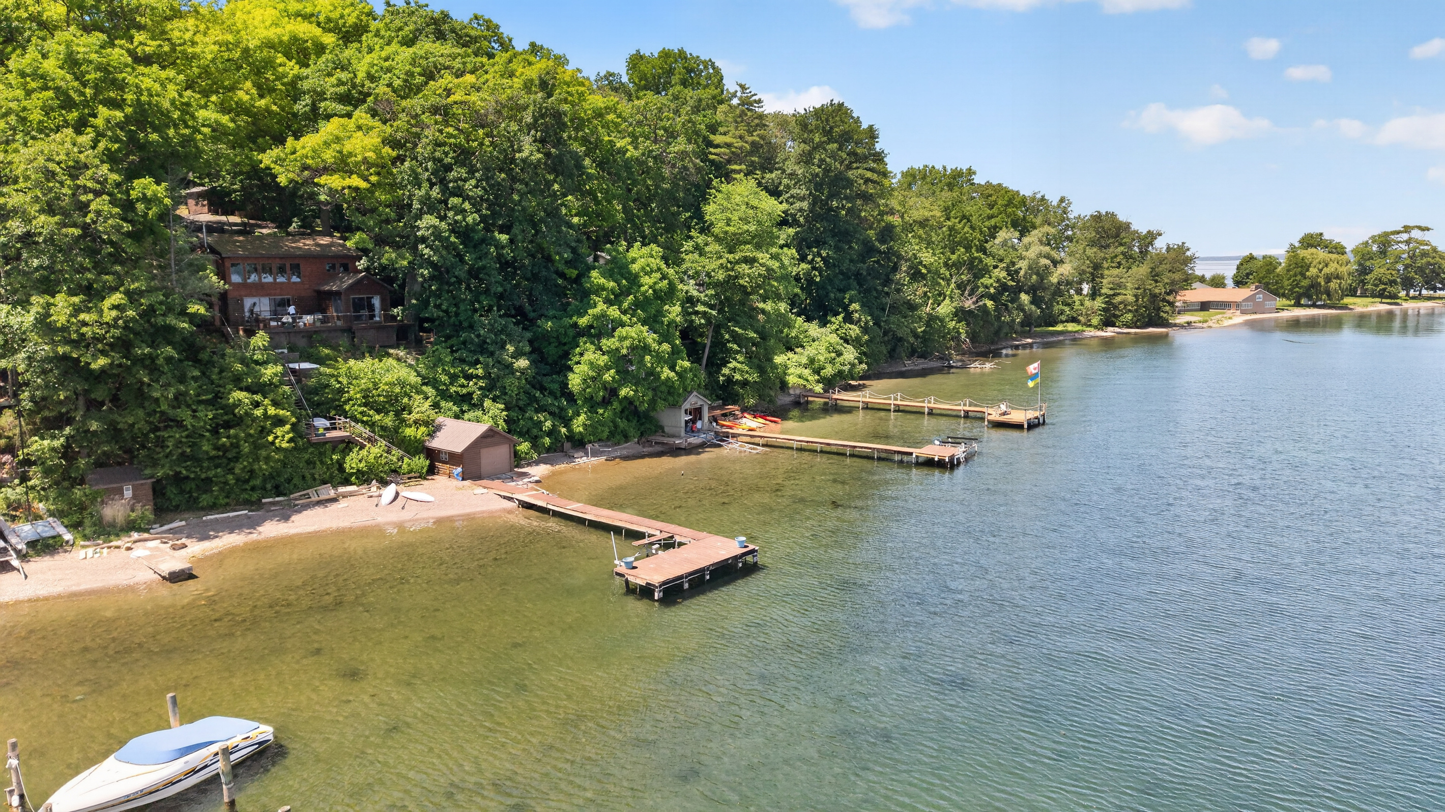 Shoreline with docks extending into the lake