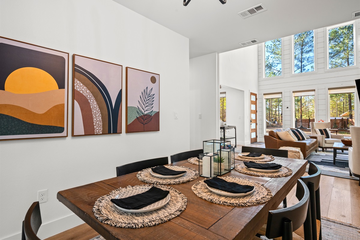 This view showcases the dining table setup, perfect for gathering everyone together in one place.