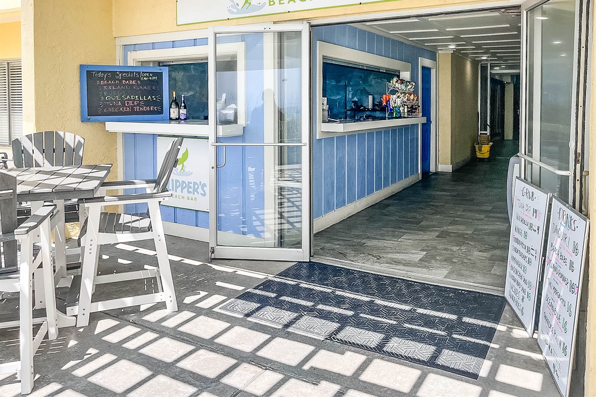 Located at beach entrance to the building