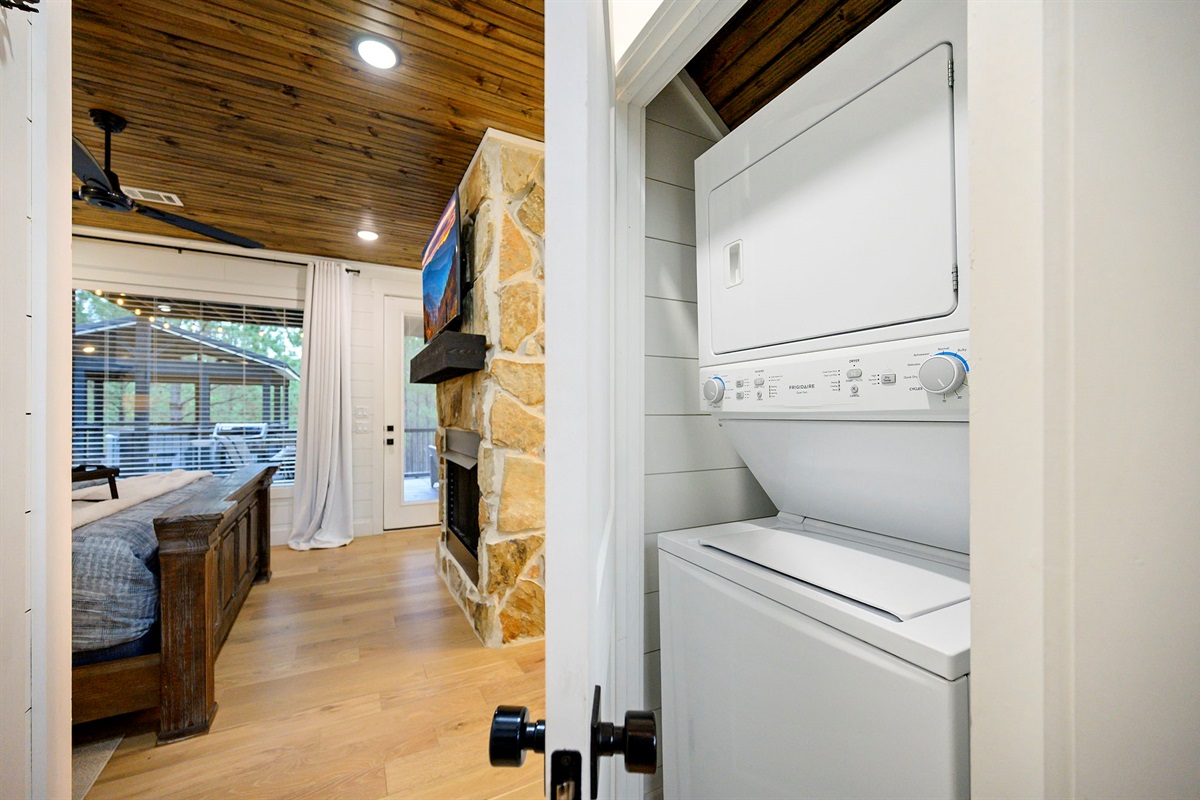 Stackable washer and dryer for convenience during longer stays.