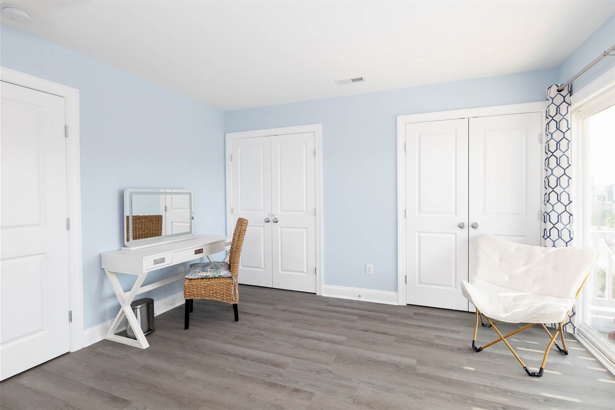 This king suite has plenty of room, dual closets, a vanity space, and direct private ocean-facing balcony access