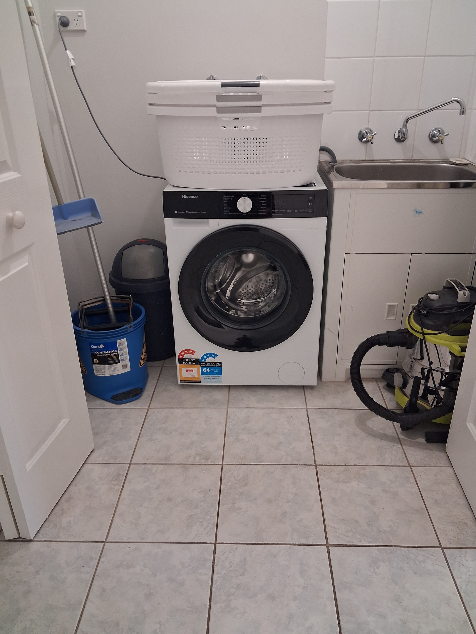 European style laundry with front load washing machine