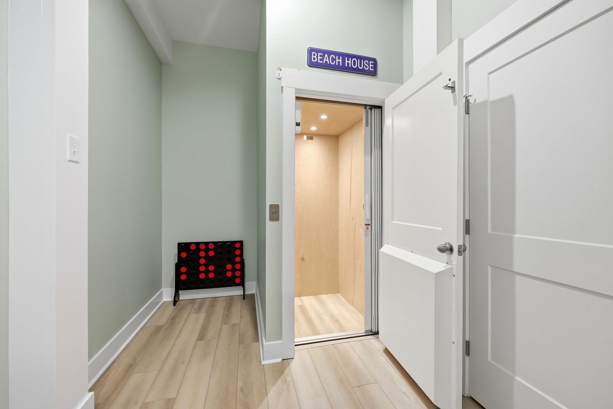 An in-home elevator provides convenient access to every floor, making the home comfortable for guests of all ages