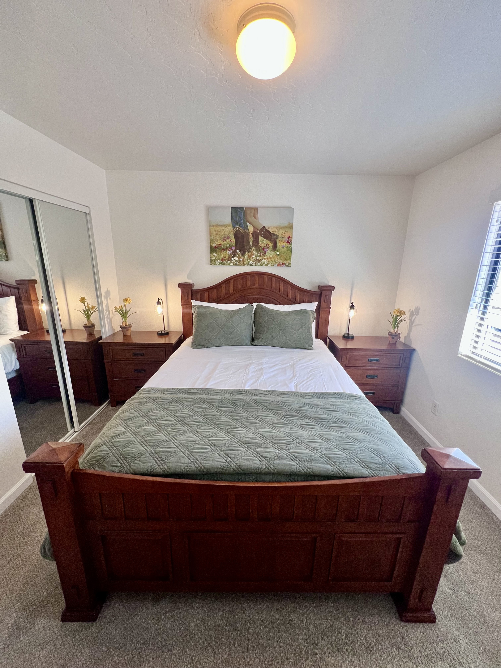 Unwind in this third bedroom with a plush queen-size bed ensures a restful night's sleep.