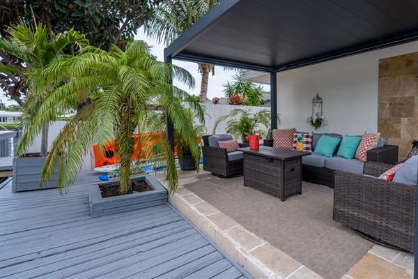 Resort-style waterfront pool and outdoor lounge area