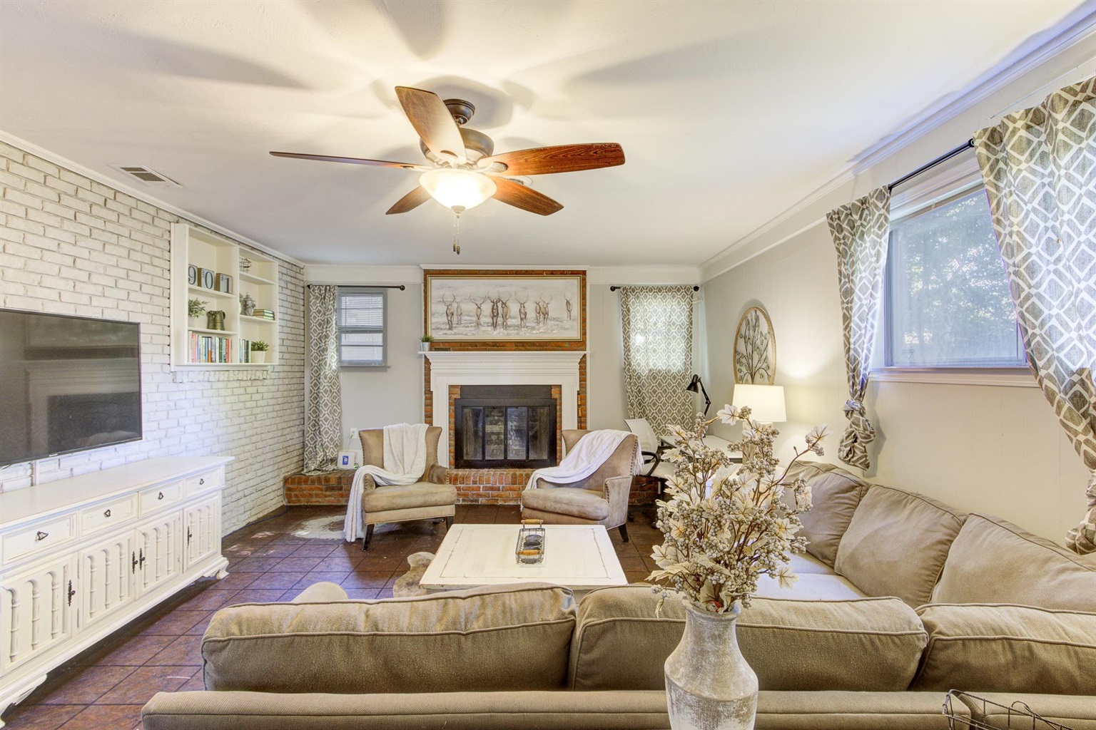 Spacious 2nd living room with desk, TV, and full size pull-out sofa bed