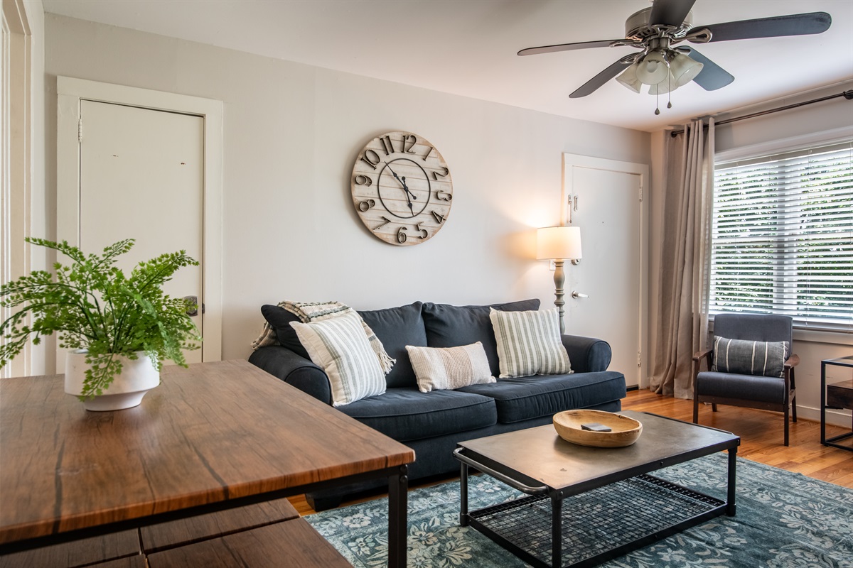 Bright and inviting living space featuring a comfortable blend of modern style and cozy touches — perfect for relaxing and unwinding.