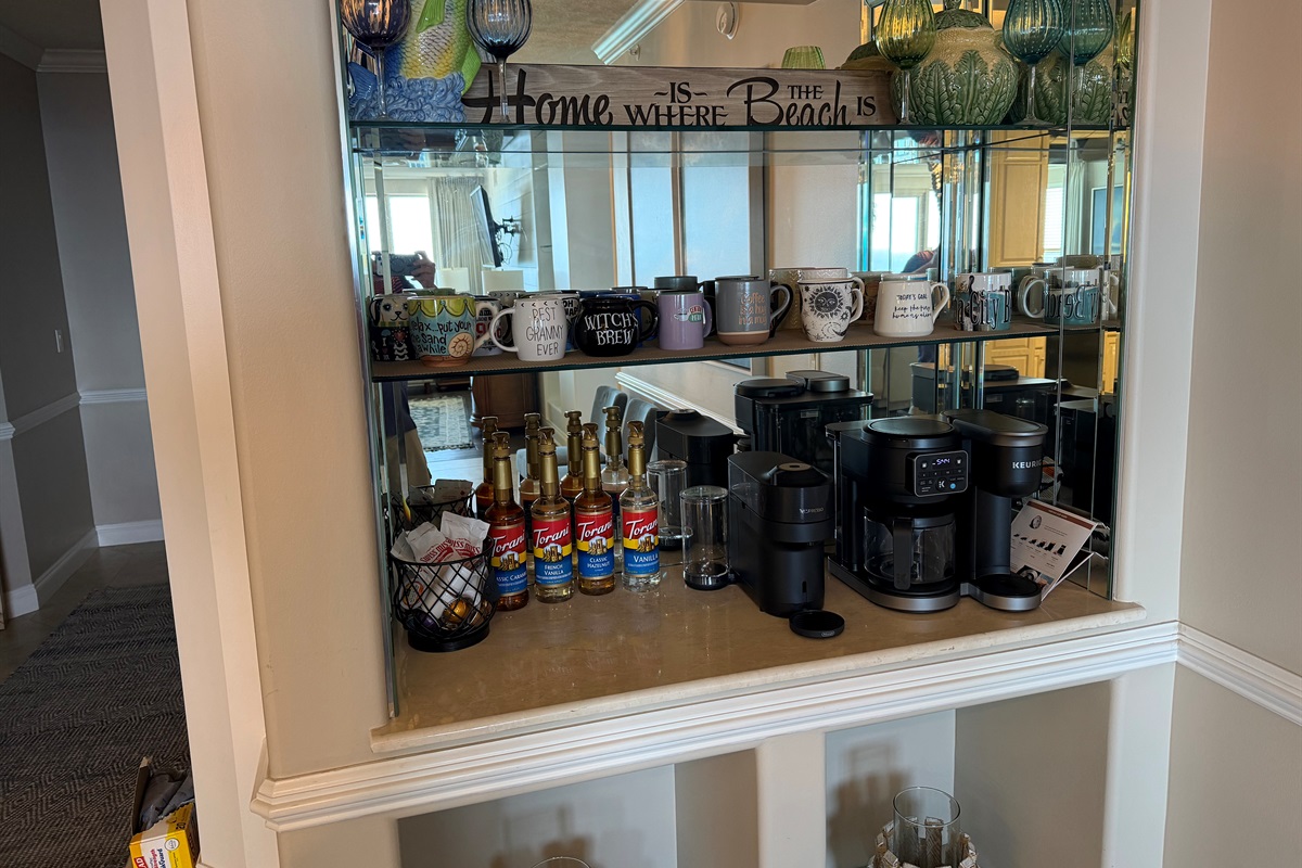 fully stocked coffee bar with keurig, Nespresso, drip coffee and flavorings