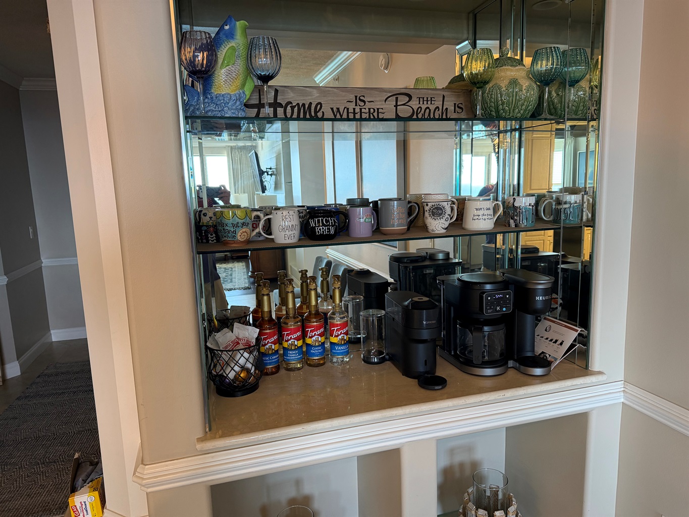 fully stocked coffee bar with keurig, Nespresso, drip coffee and flavorings