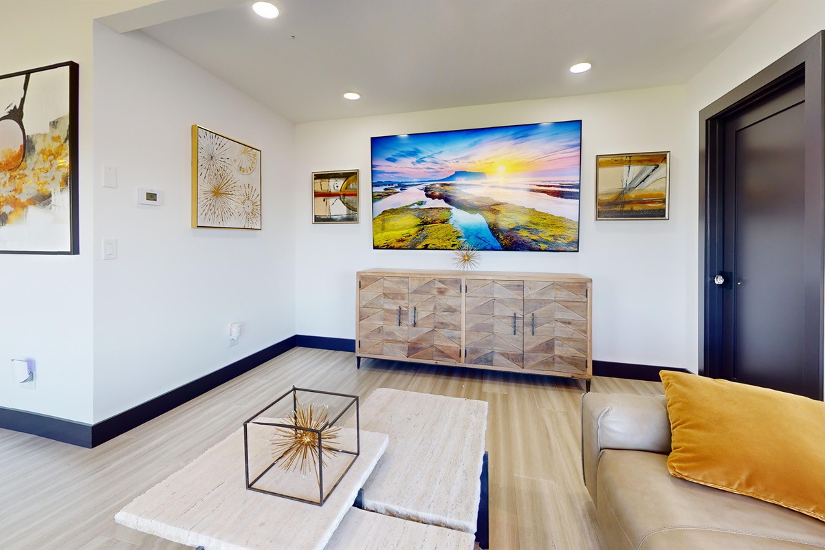 Upstairs living room has plenty of seating and SmartTV.
