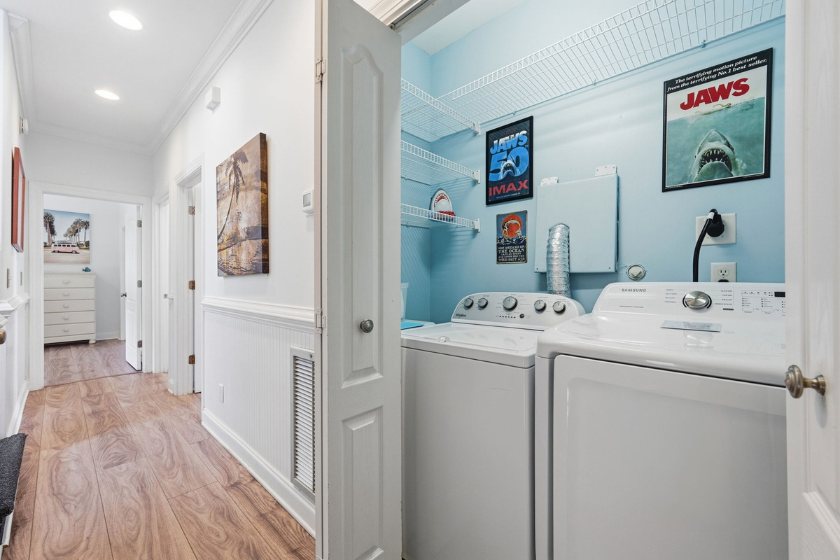 Laundry tucked conveniently in the hallway for easy mid-stay refreshes without leaving the flow of the home