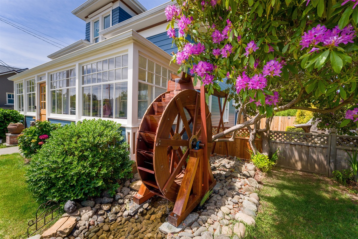 Victorian home exterior view showing the architecture and front yard
