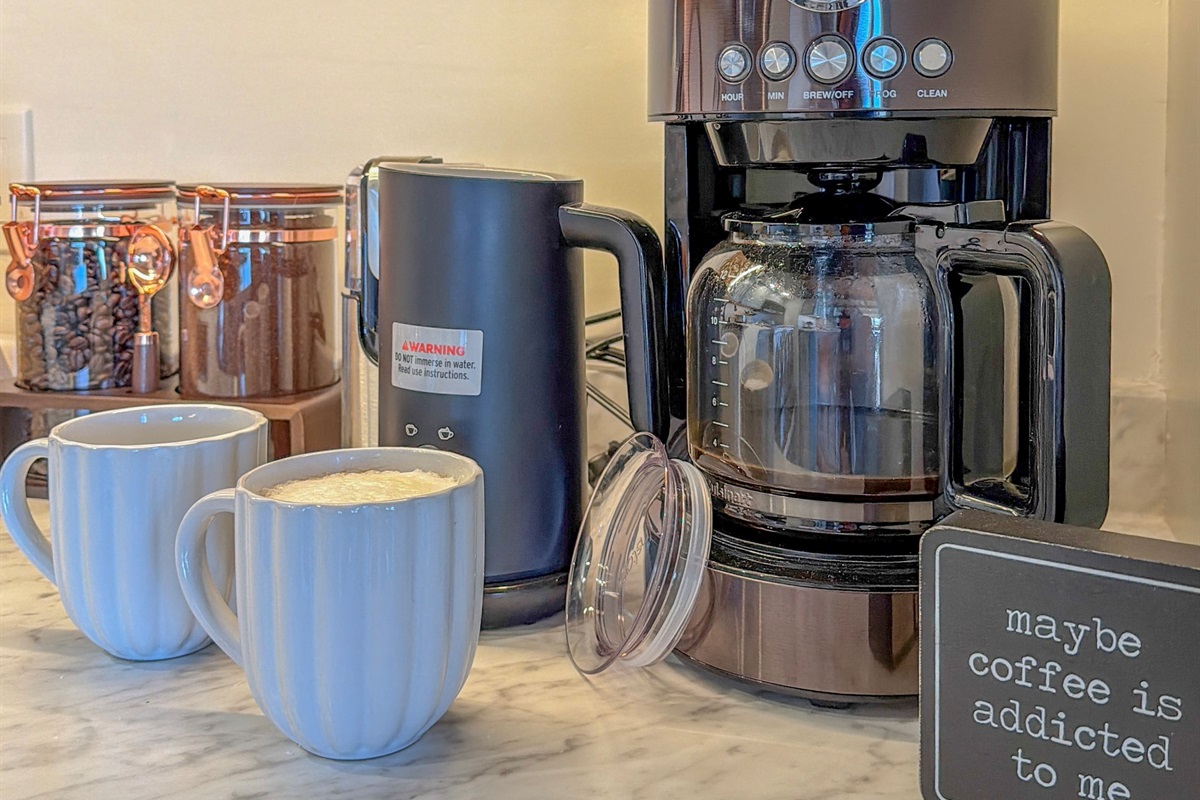 … coffee pot, milk frother, coffee grinder, whole bean & ground coffee!