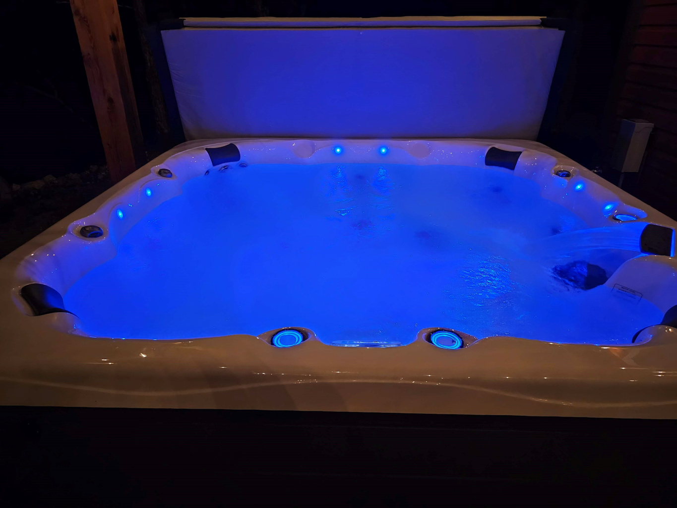 Relax under the stars in the private 8 person hot tub after Branson adventures.