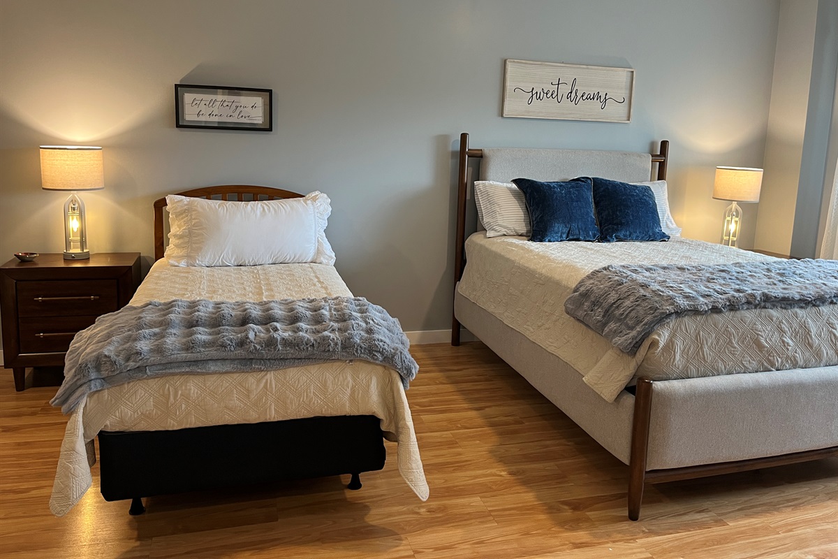 Lower level Family suite with Queen, Twin and lounge area