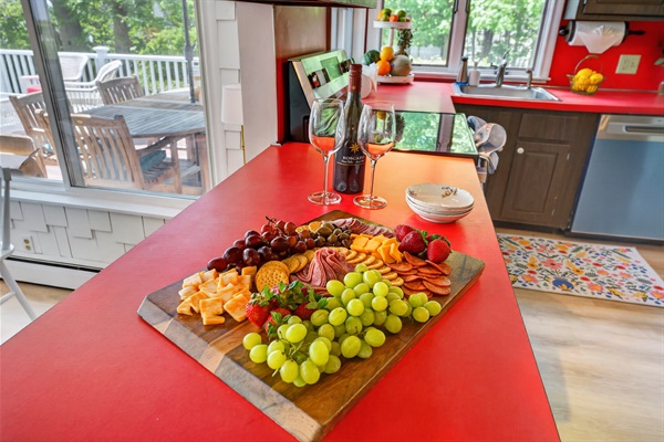Spacious kitchen island perfect for casual meals, morning coffee, or gathering while cooking and entertaining.
