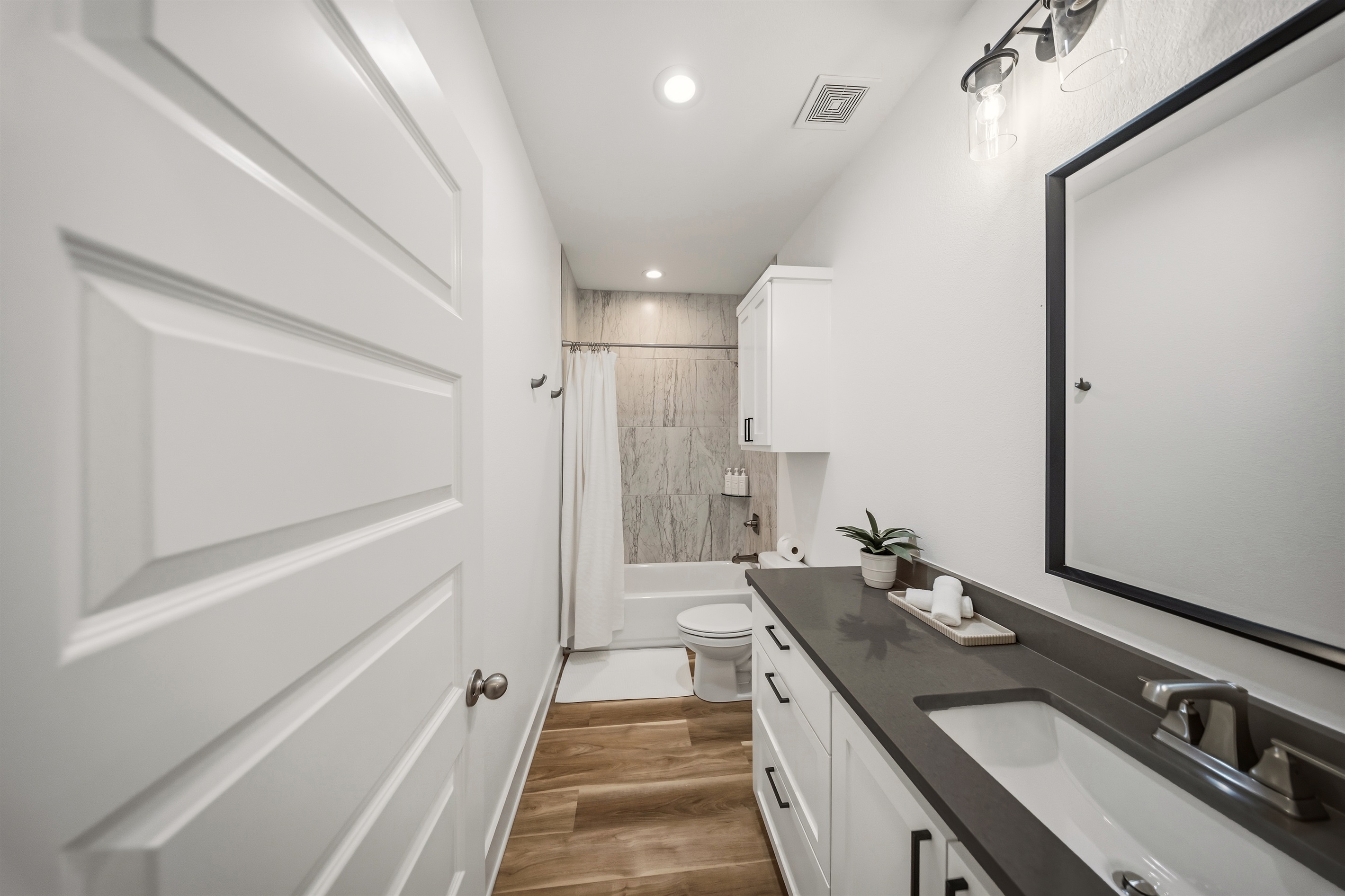 Upstairs full bathroom conveniently located near bedrooms