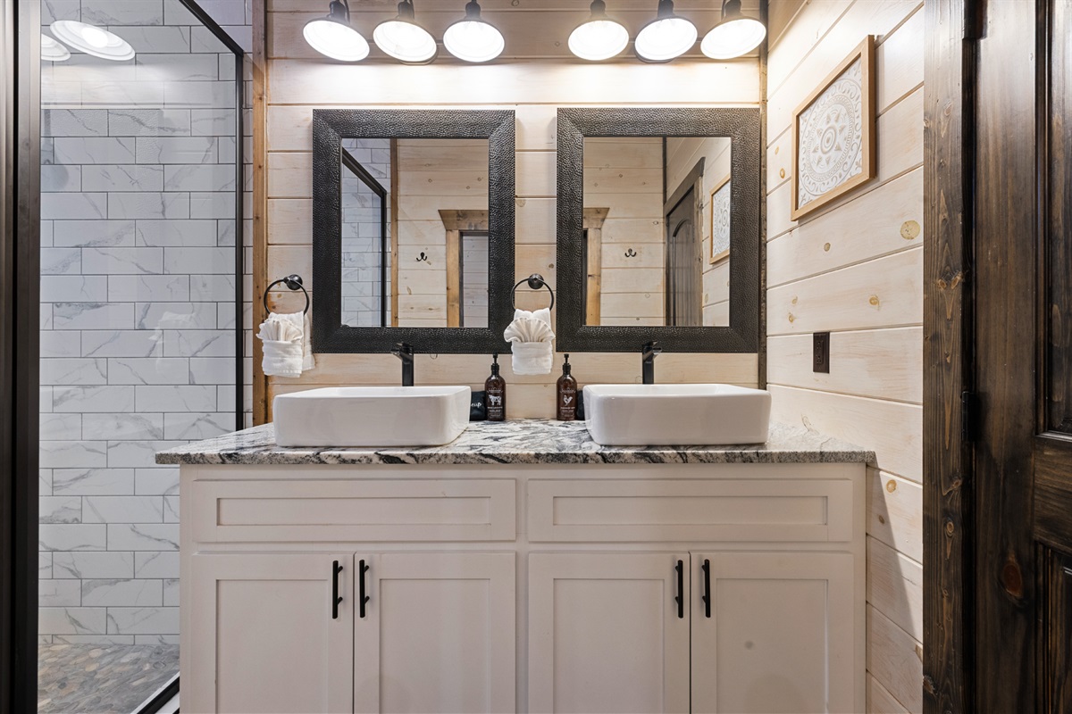 Ensuite bathroom with double vanities and luxury and spacious standing showers in both king bedrooms and bunkhouse!