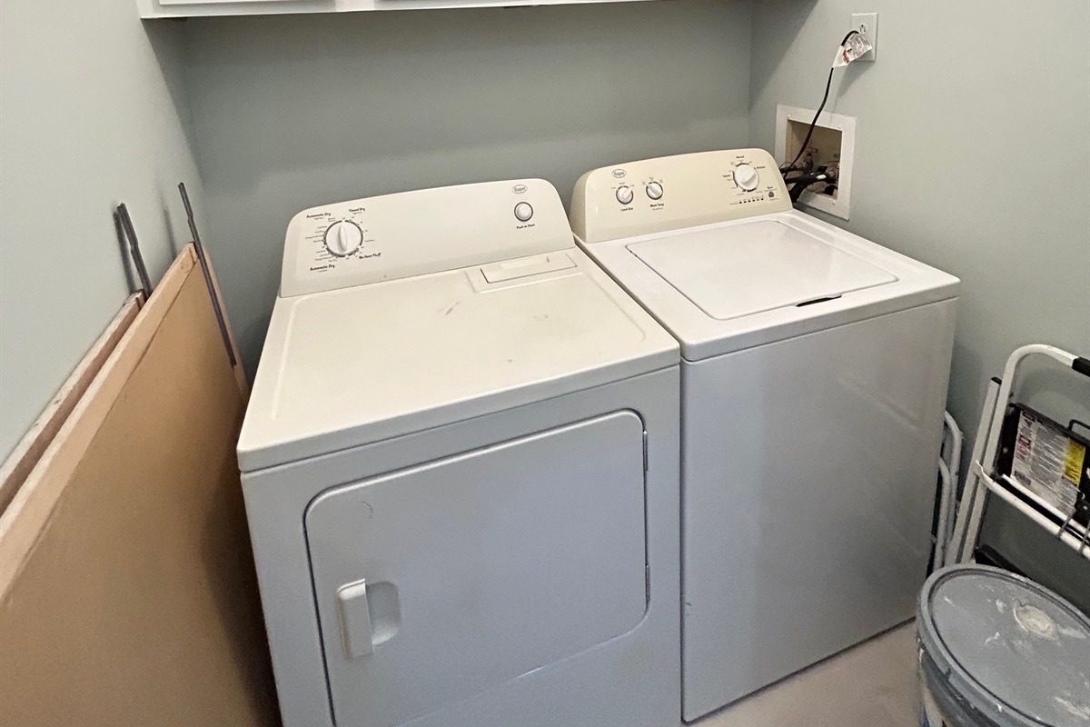 Private Laundry Room located off front entry porch.