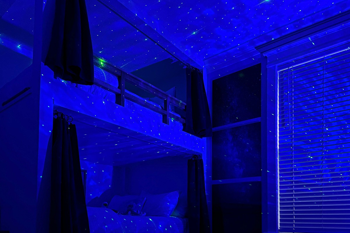 Turn on the starlight projector for a more cosmic sleepy time.