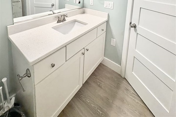 Full bathroom accessible from living area and Bedroom 2