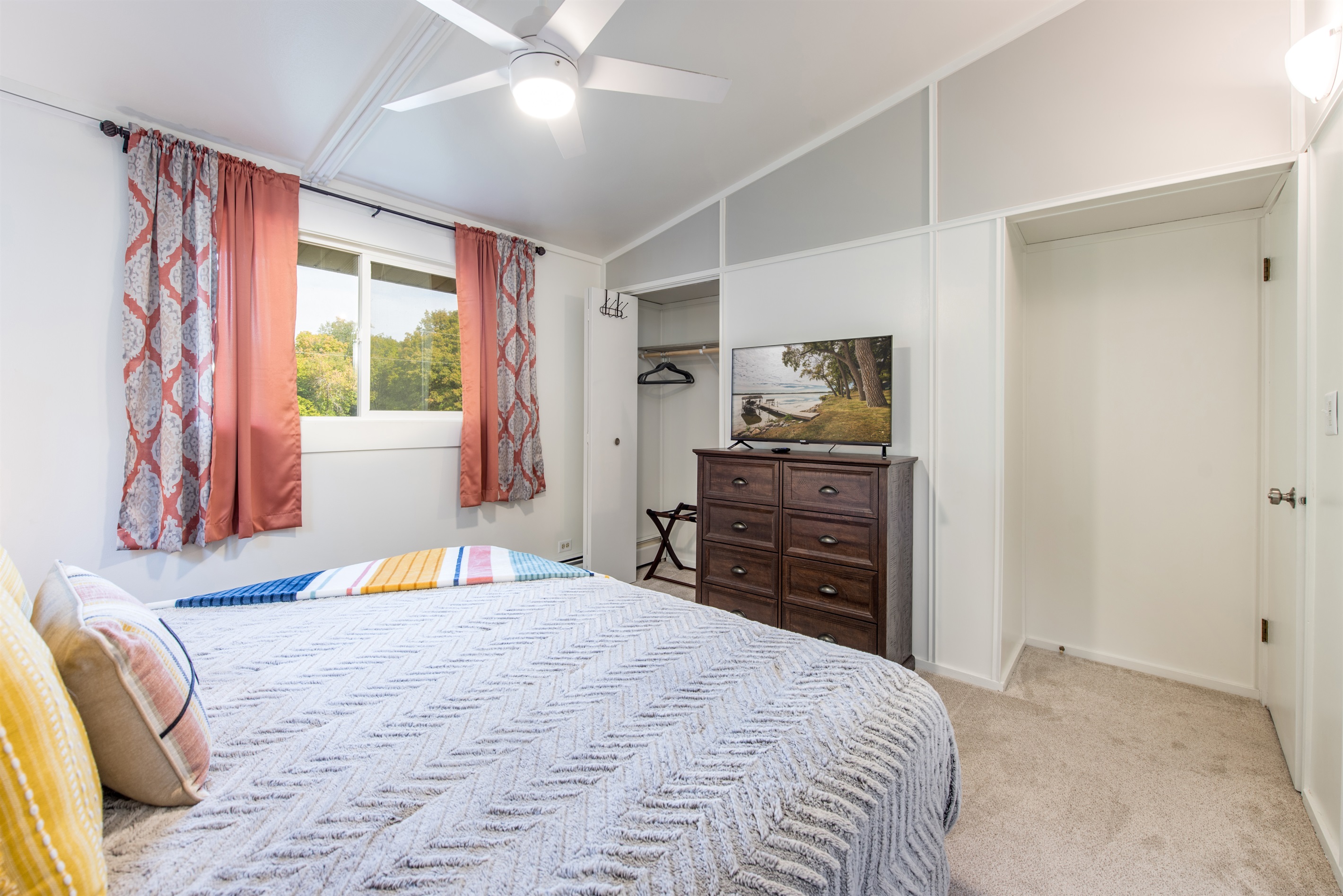 Bedroom 2 with storage and TV