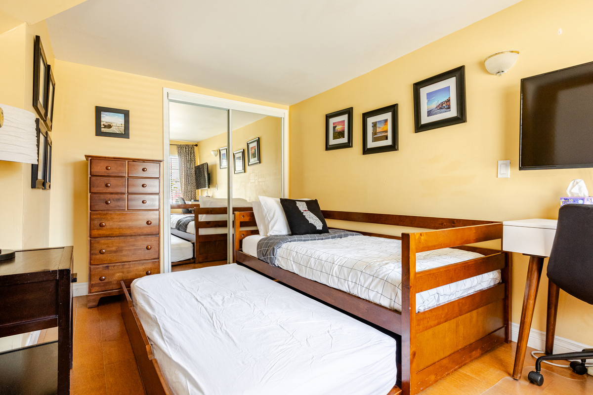 Bedroom #2 trundle bed easily slides in and out.