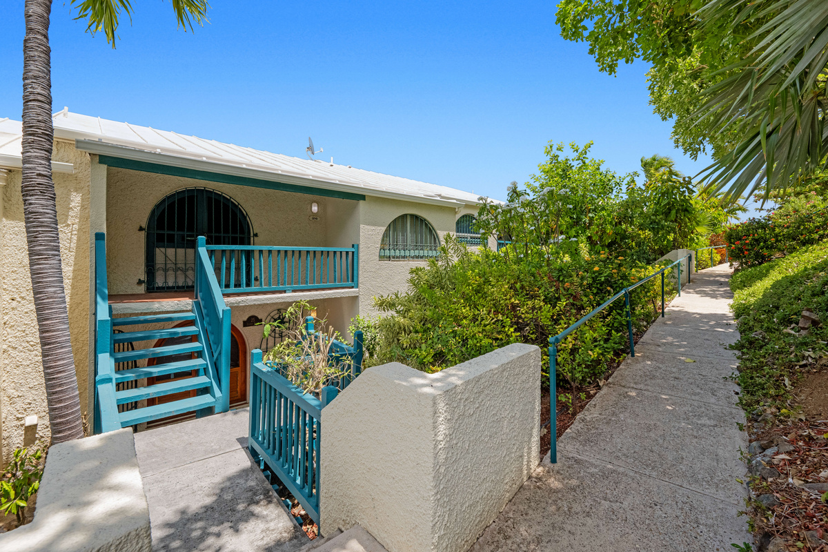 Your vacation begins with a peaceful stroll through the beautifully maintained grounds.