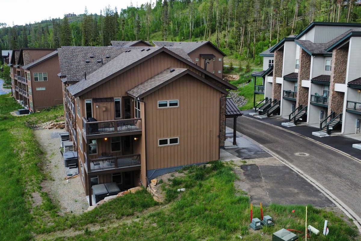 view from above showing the private deck and hot tub, plus all 3 decks connected to the unit
