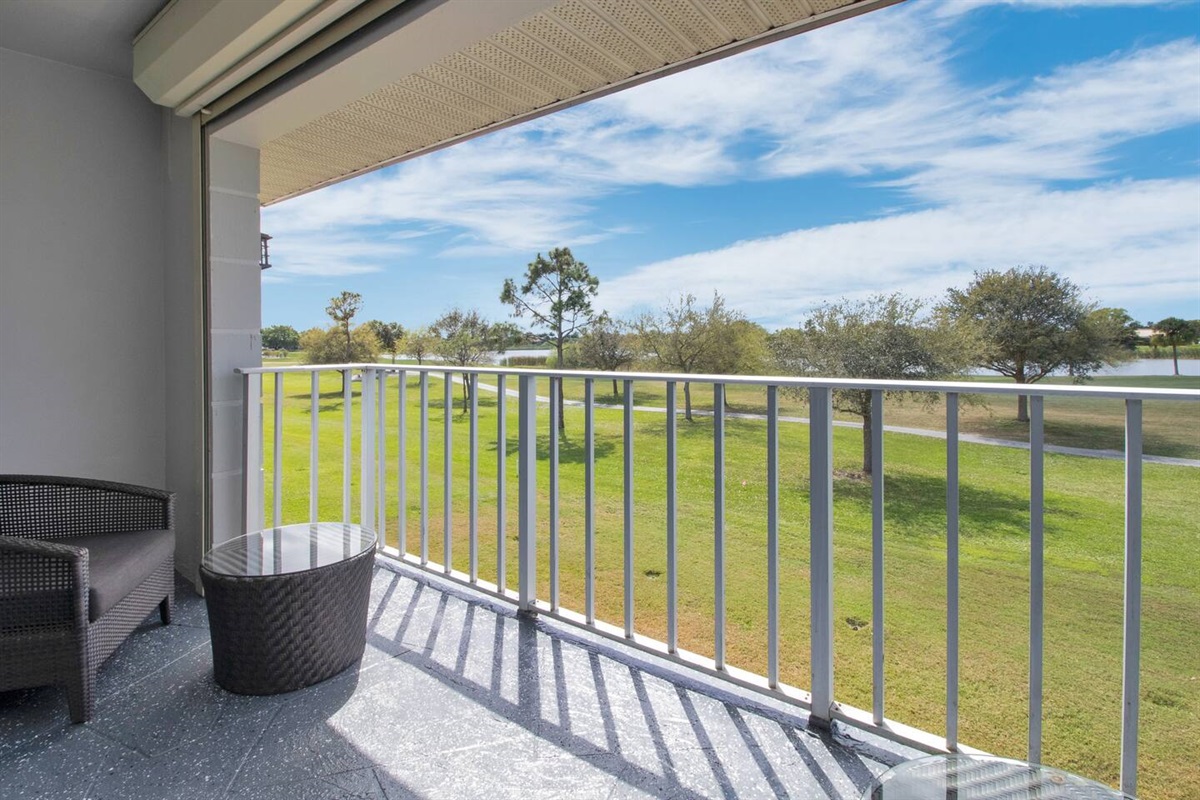 Watch the wild life from here, second floor balcony.  Two chairs and side tables.