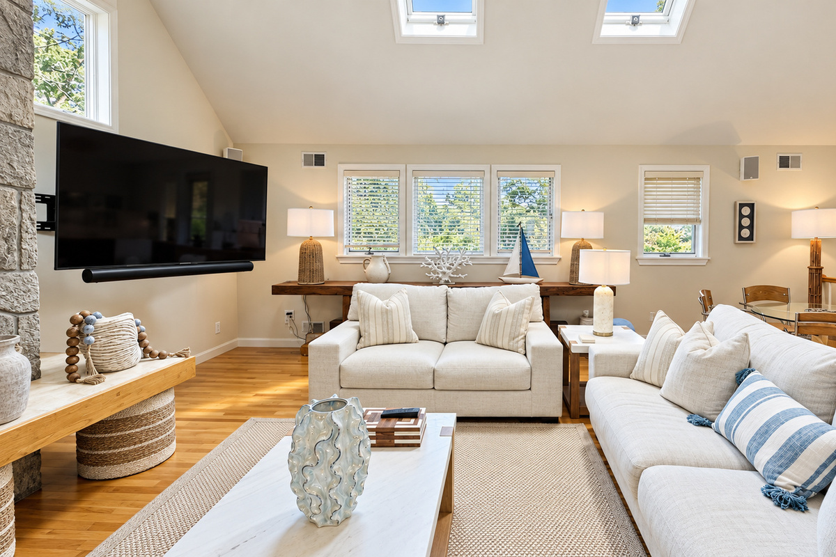 Living room with sectional seating and TV