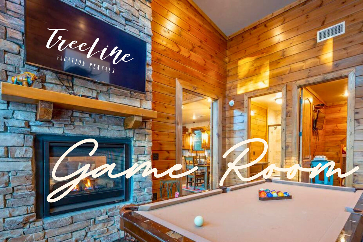 Warm up by the see-through fireplace in the game room, adding a cozy touch to your entertainment space.