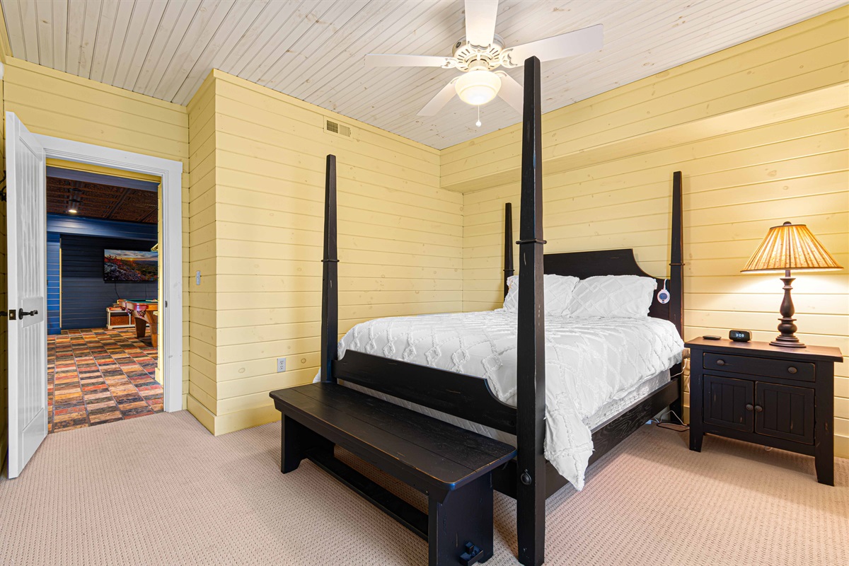Downstairs Queen Bedroom 3: Unwind in this charming room with elegant decor and serene vibes!