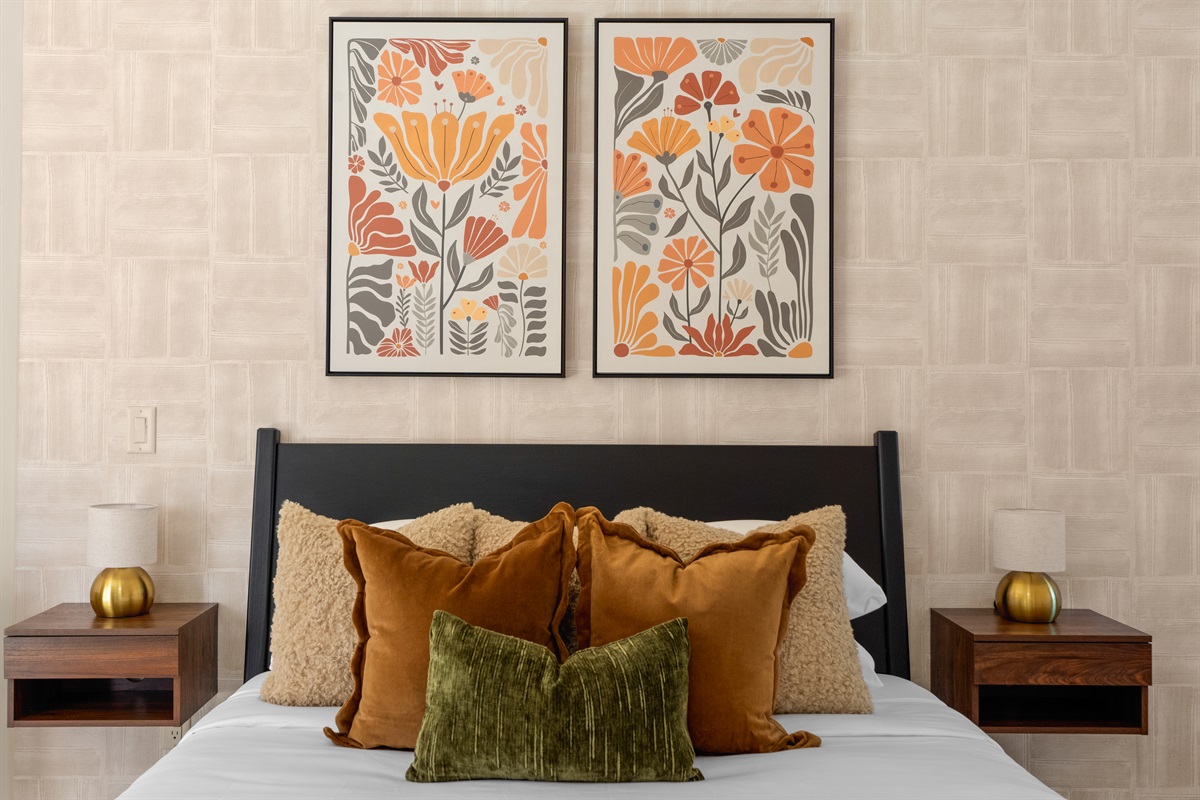 Desert modern elegance. Relax in this thoughtfully designed guest suite, featuring warm earthy tones, custom textured wallpaper, and elevated boutique comforts.