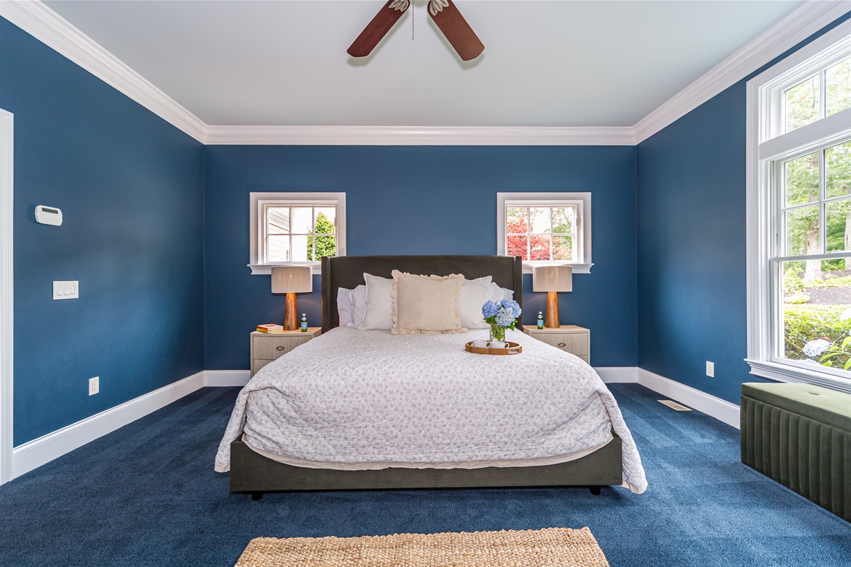 Rest easy in the first bedroom—bright, spacious, and made for slow mornings.