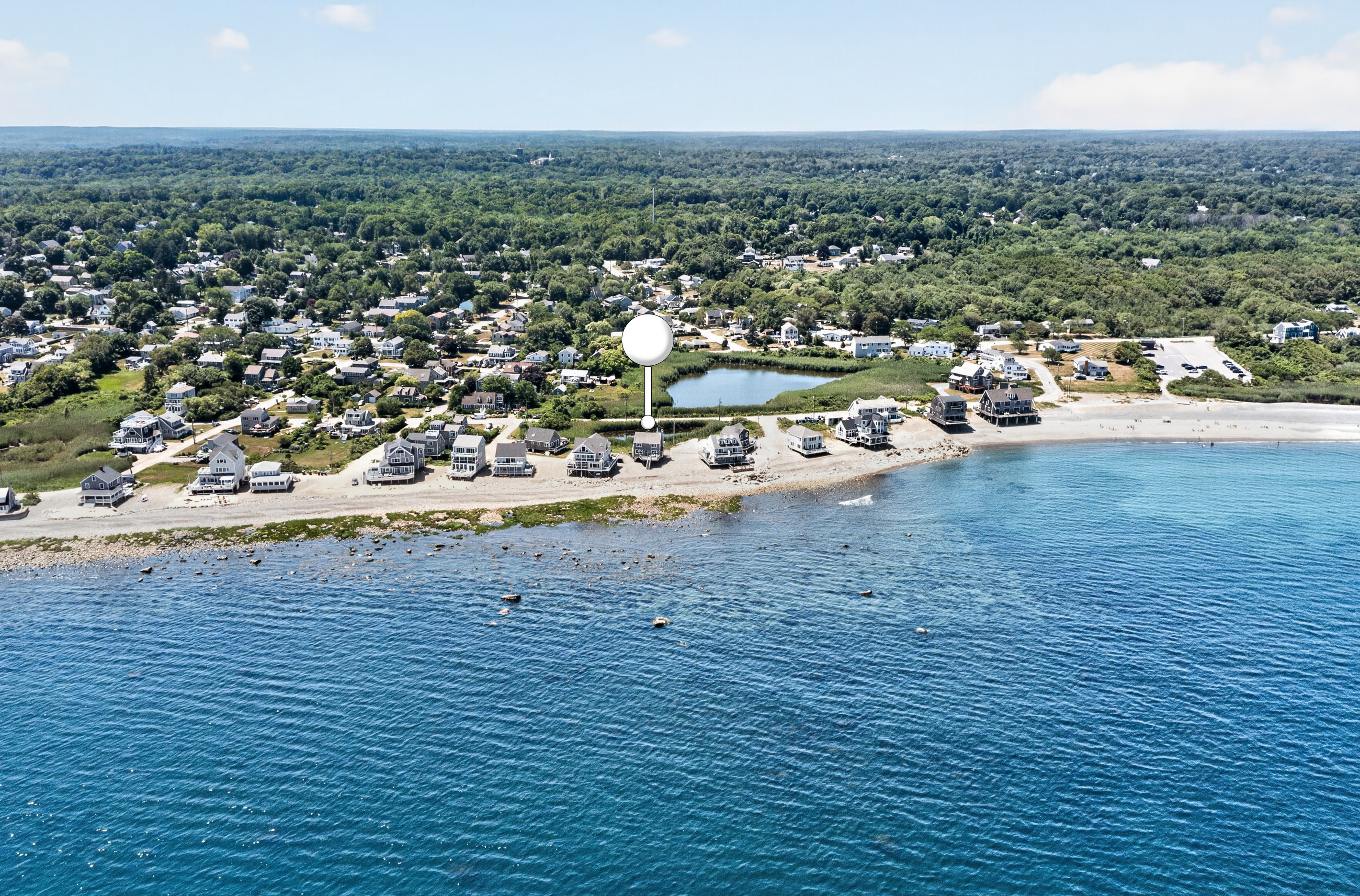 Enjoy a beautiful coastal setting surrounded by water, beach, and a charming seaside neighborhood.