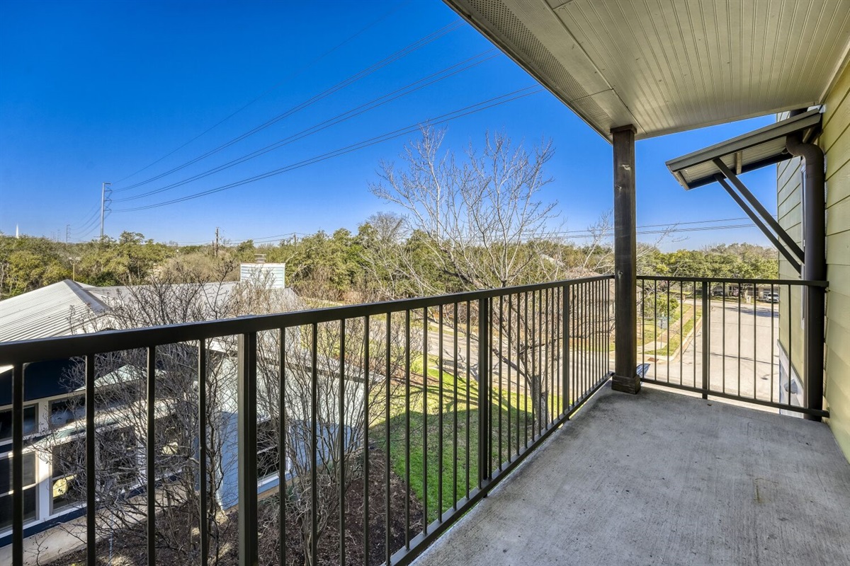 Spacious balcony with scenic views and plenty of natural light.