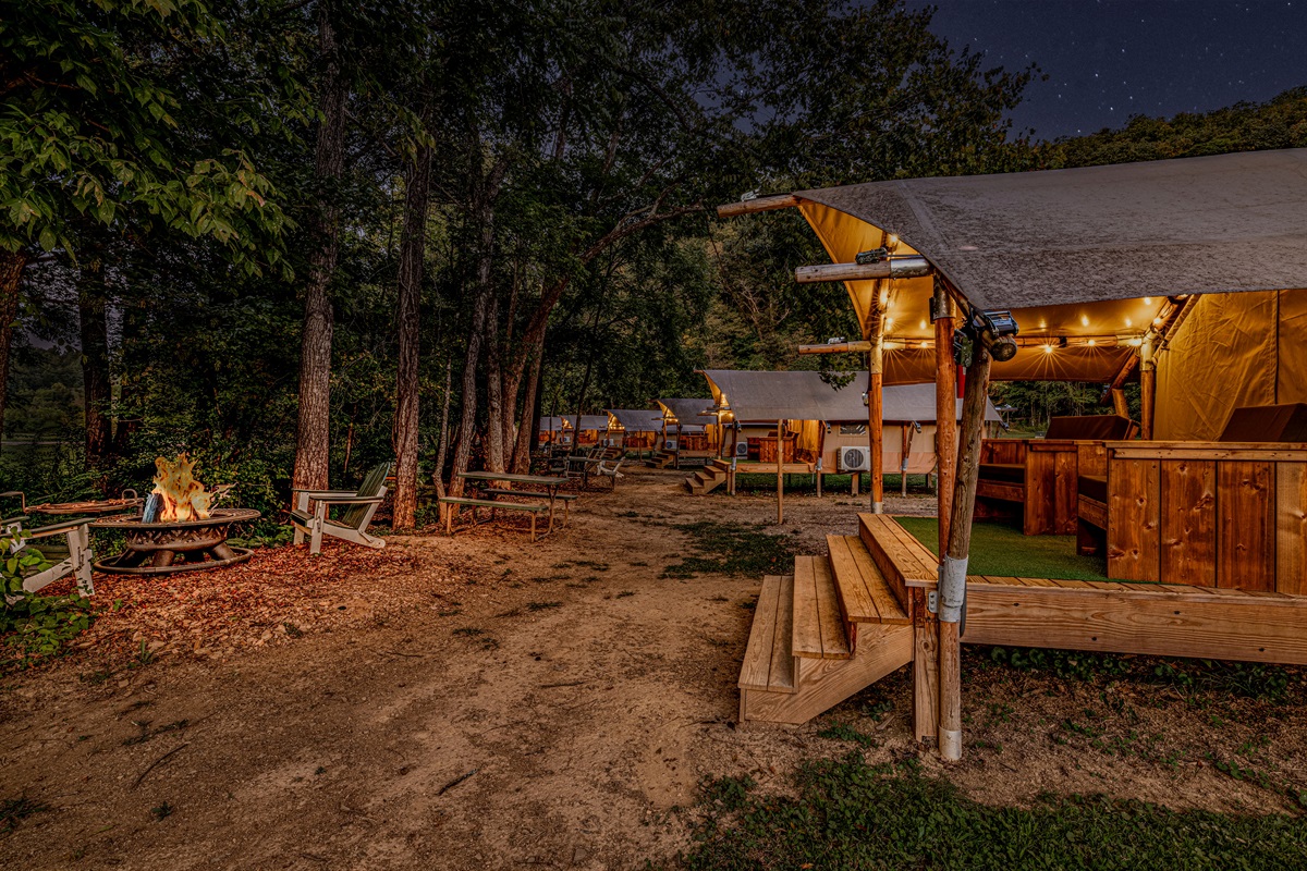 When the sun goes down, the ambiance turns on. Enjoy the serene glow of the site lighting while relaxing just steps from your comfortable tent.
