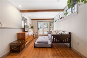 Lower level with sleeper sofa and tv