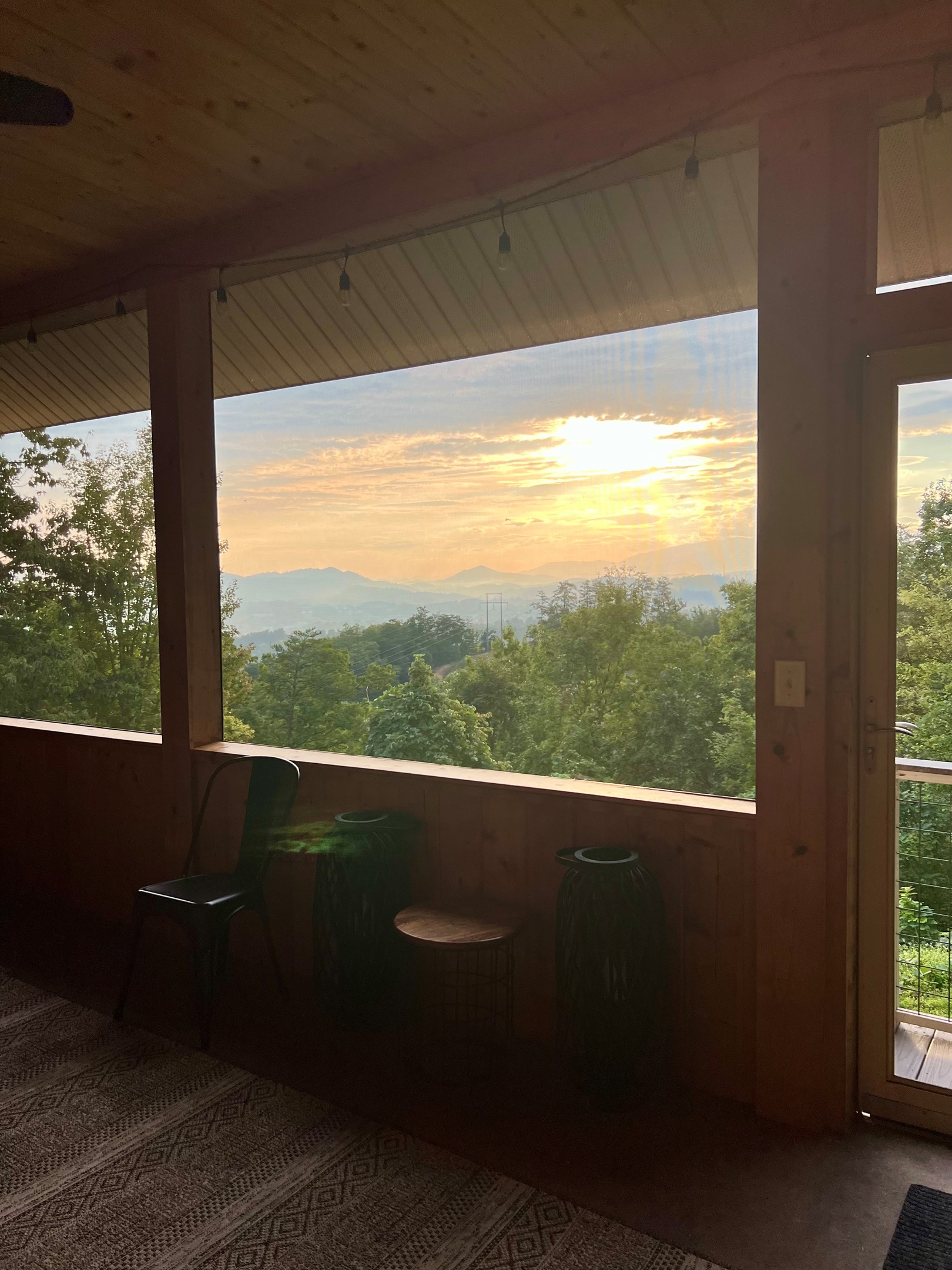 Sunrise view from the screened-in porch area