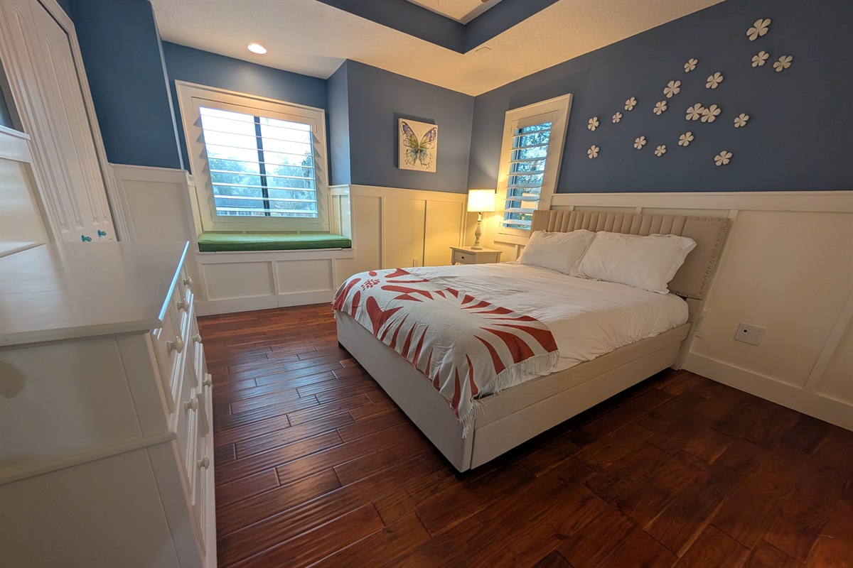 Beautiful upstairs guest bedroom with a queen bed and twin trundle