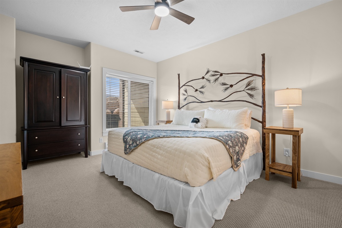 Spacious bedroom with king bed and ample storage for longer visits.