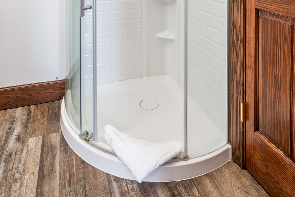 Compact walk-in shower perfect for refreshing after lake adventures